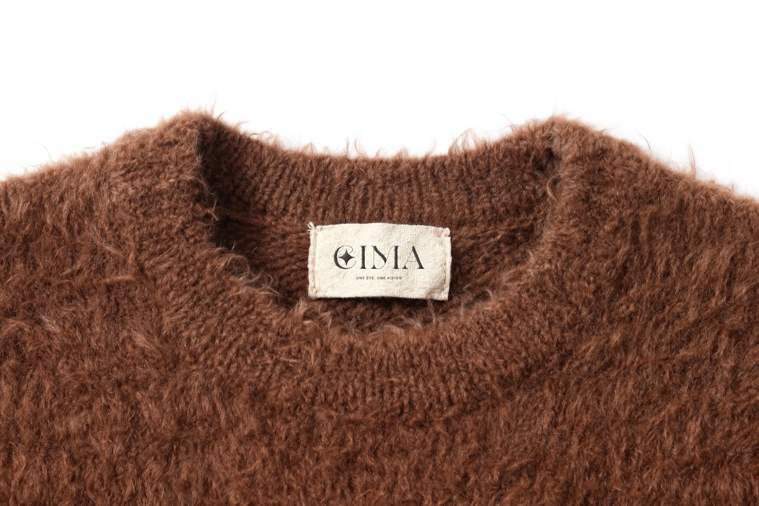 EIMA — woven sweater label