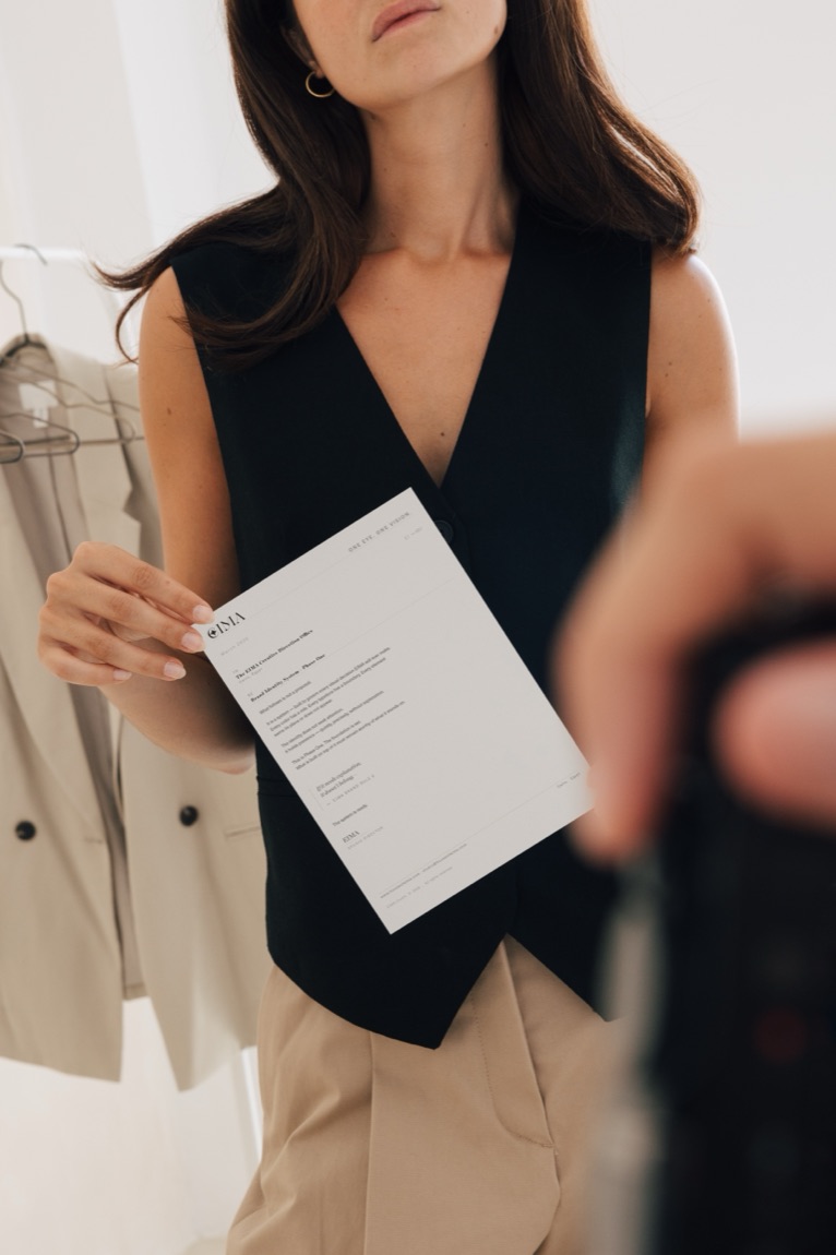 EIMA — stylist holding the spec sheet