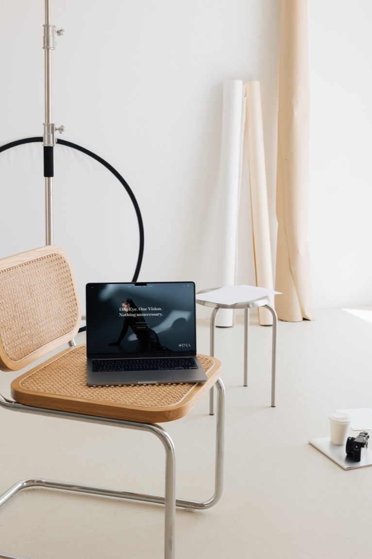 EIMA — laptop on a studio chair