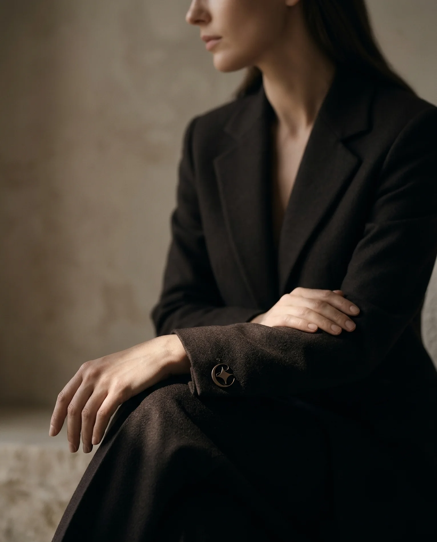 EIMA — the monogram on a tailored cuff
