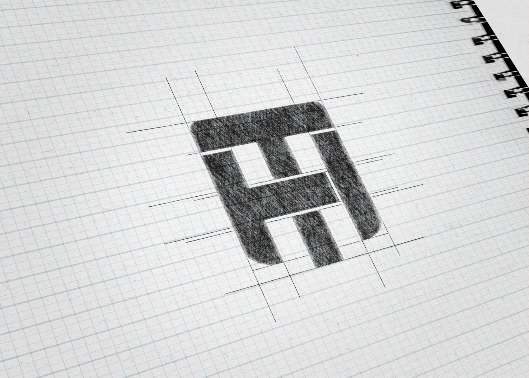 The Hi Tech Pro mark constructed on a grid — the H and T built as one geometric joint