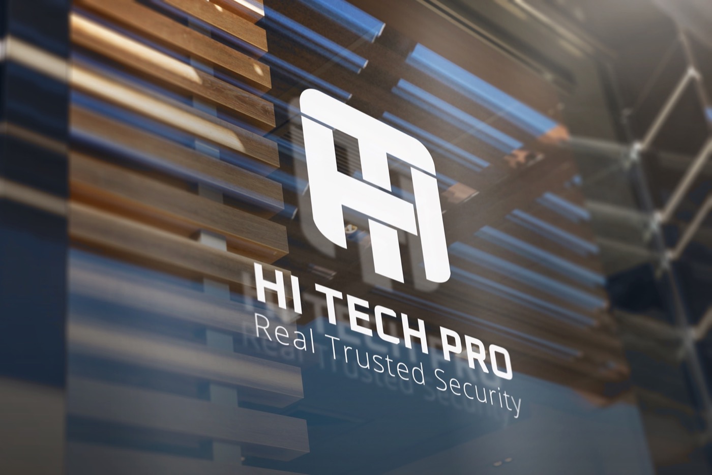 The Hi Tech Pro lockup etched onto office glass