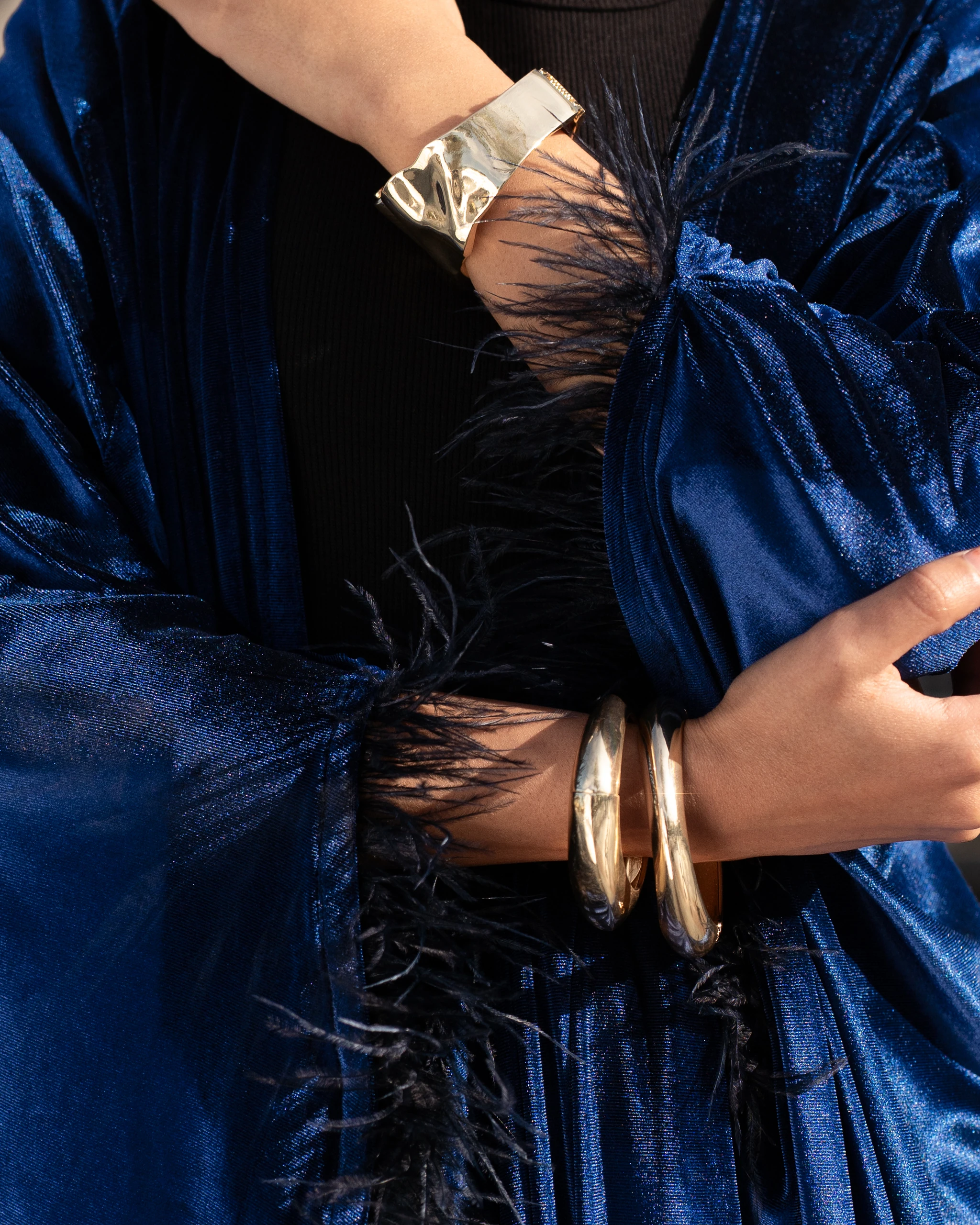 Khawia — a glossy royal-blue drape, wrist and bangle
